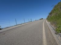 Daytime on a Low Slope Road with Asphalt Surface