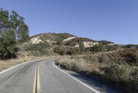 Daytime Road Trip: Clear Sky and Endless Road