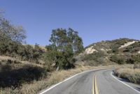 Daytime Road Trip: Clear Sky and Endless Road