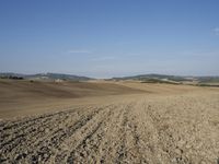 the plowed field has been empty and ready to be cultivated for cultivation in the early afternoon