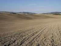 the plowed field has been empty and ready to be cultivated for cultivation in the early afternoon