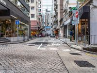 an image of a downtown street in the daytime time from a corner to the bottom