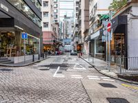 an image of a downtown street in the daytime time from a corner to the bottom