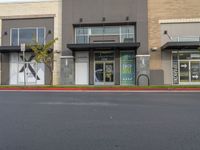 Daytime View of Storefront in Suburban Area with Vegetation