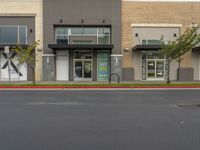 Daytime View of Storefront in Suburban Area with Vegetation