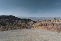 a panoramic view of mountains and a rocky landscape in death valley national park