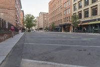 an empty city street is empty and has signs on it that say stop - to - park