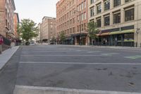 an empty city street is empty and has signs on it that say stop - to - park