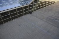 the view from the air looking down on an outside building and parking lot with cars