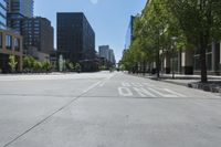 the city road is empty of people and no vehicles to be seen on it, but no cars can be seen on it