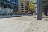 a fire hydrant in front of an office building with glass doors and windows on a sunny day