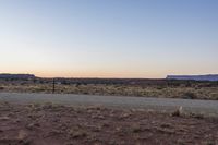Desert Dawn: A Clear Sky Over the Sand
