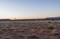 Desert Dawn: A Clear Sky Over the Sand