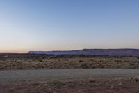 Desert Dawn: A Clear Sky Over the Sand