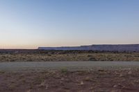 Desert Dawn: A Clear Sky Over the Sand