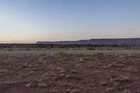 Desert Dawn: A Clear Sky Over the Sand