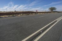 Desert Landscape with Clear Sky and Endless Road