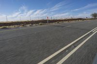 Desert Landscape with Clear Sky and Endless Road