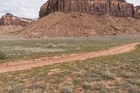 Desert Landscape in Utah with Grey Sky and Mountain Landforms