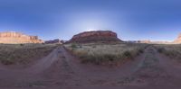 a panoramic photograph of a mountain in the distance in the desert in arizona