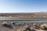 Desert Road: Asphalt and Red Rock
