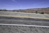 Desert Road: Clear Sky and Red Rock in Canyonlands, Utah