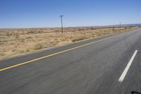 the view from inside a car of an empty highway in motion with cars on both sides of it