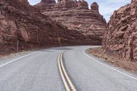 Desert Road in Utah: Surrounded by Red Rocks