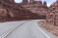 Desert Road in Utah: Surrounded by Red Rocks