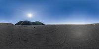 a panoramic view of a rocky area in the middle of a desert with rocks