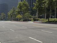 this empty street is deserted without traffic in sight for the traffic to pass by it