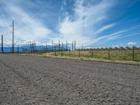 A Scenic Dirt Road: Gravel, Sand, and a Power Plant