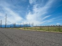 A Scenic Dirt Road: Gravel, Sand, and a Power Plant