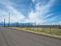 A Scenic Dirt Road: Gravel, Sand, and a Power Plant