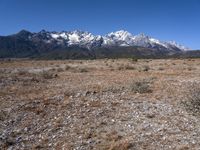 Dirt Road in Lijiang, China: A Mountain Landscape