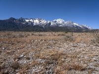 Dirt Road in Lijiang, China: A Mountain Landscape