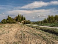 Dirt Road in Tuscany Landscape under Clear Sky