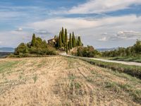 Dirt Road in Tuscany Landscape under Clear Sky