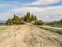 Dirt Road in Tuscany Landscape under Clear Sky