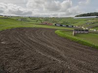 Dirt Road in the UK: Surrounded by Green Fields