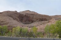 Dirt Road in Utah: Surrounded by Majestic Mountain Landforms