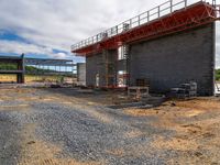 construction work underway at the base of a building that sits in the middle of construction