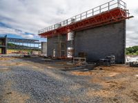 construction work underway at the base of a building that sits in the middle of construction