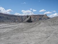 Dirt Tracks of Factory Butte: Gravel and Sand Terrain