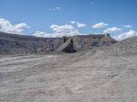 Dirt Tracks of Factory Butte: Gravel and Sand Terrain