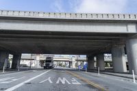 the double level highway is a crosswalk in between two highway platforms overpasses