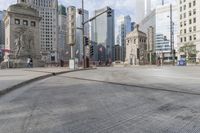 a street scene in the middle of downtown skyscrapers and city streets from an angle