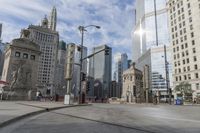 a street scene in the middle of downtown skyscrapers and city streets from an angle