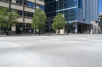 the empty streets are lined with tall buildings and people on bicycles are standing around the corner