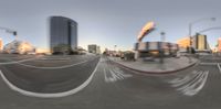 a blurry view of a man skateboarding on a street in the city with buildings